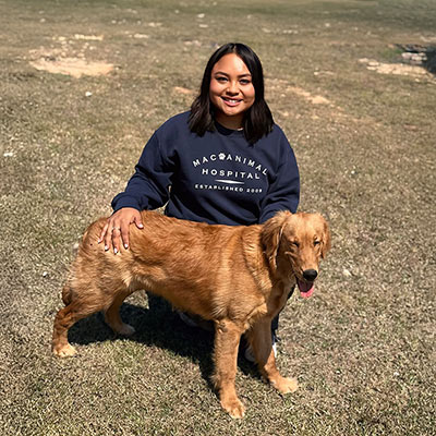 Monserrath-Lead-Receptionist-400px-sq-1 Monserrath with her dog outdoors